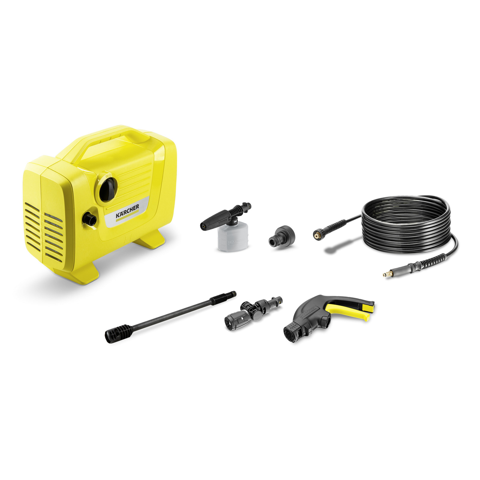 Yellow Kärcher high-pressure cleaner with hose, spray gun, and various attachments on a white background.