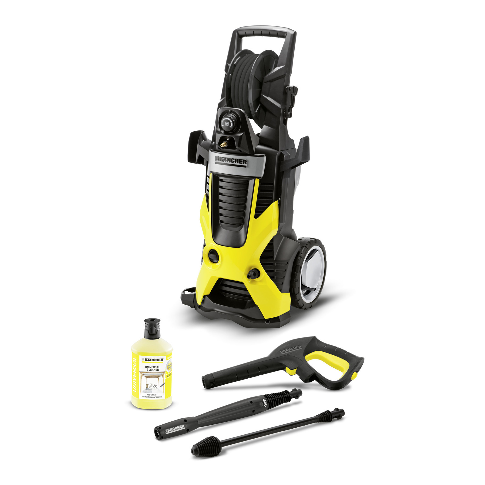 Kärcher high-pressure cleaner with hose reel, detergent bottle, spray gun, and two lance attachments on a white background.