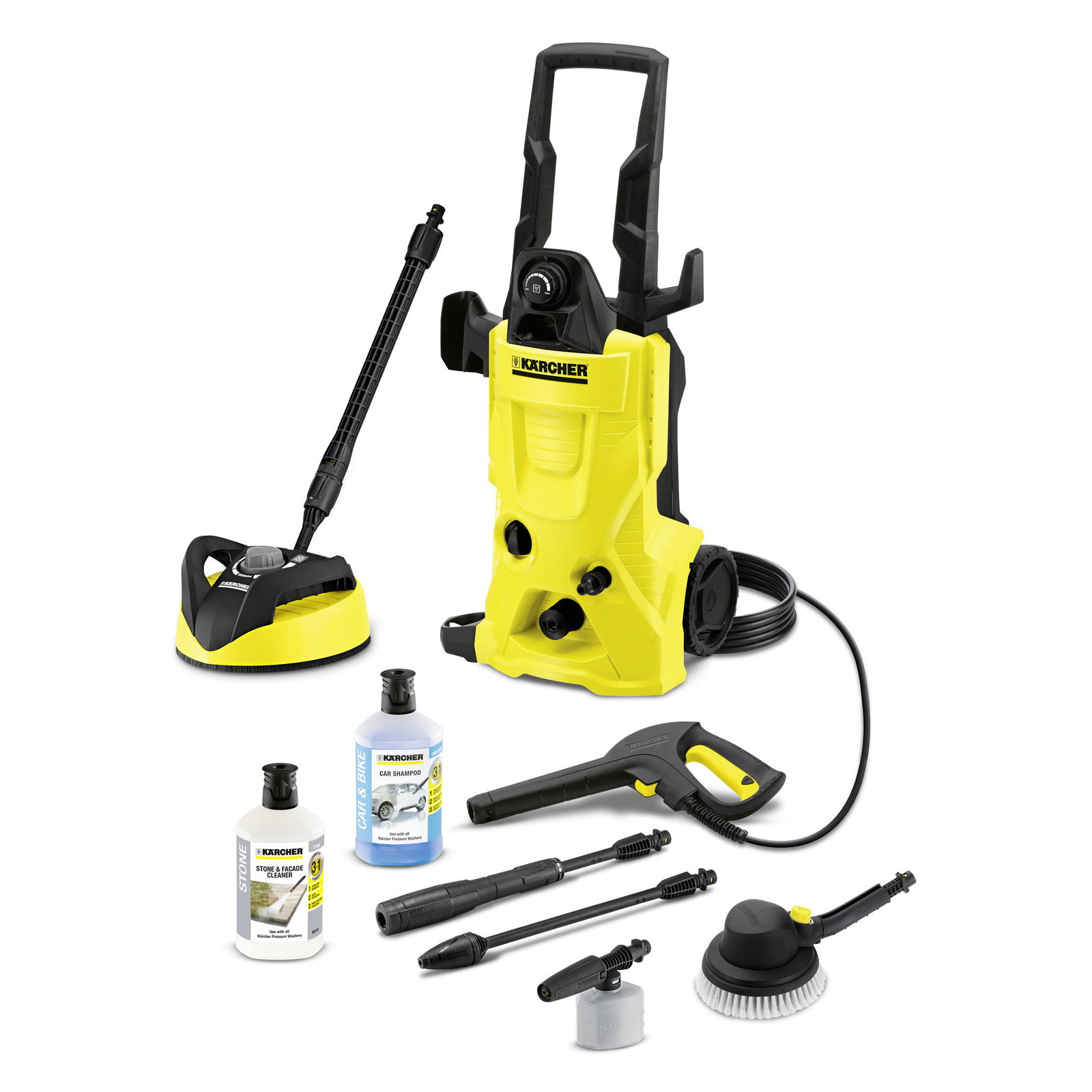 Kärcher high-pressure cleaner with accessories, including nozzles, cleaning brushes, and bottles of stone and car shampoo.