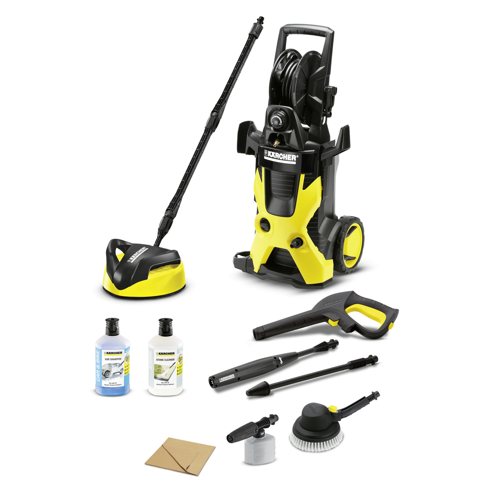Kärcher high-pressure cleaner with accessories, including detergent bottles, spray gun, nozzles, brush, and hose reel, on a white background. Kärcher high-pressure cleaner with accessories, including detergent bottles, spray gun, nozzles, brush, and hose reel, on a white background.