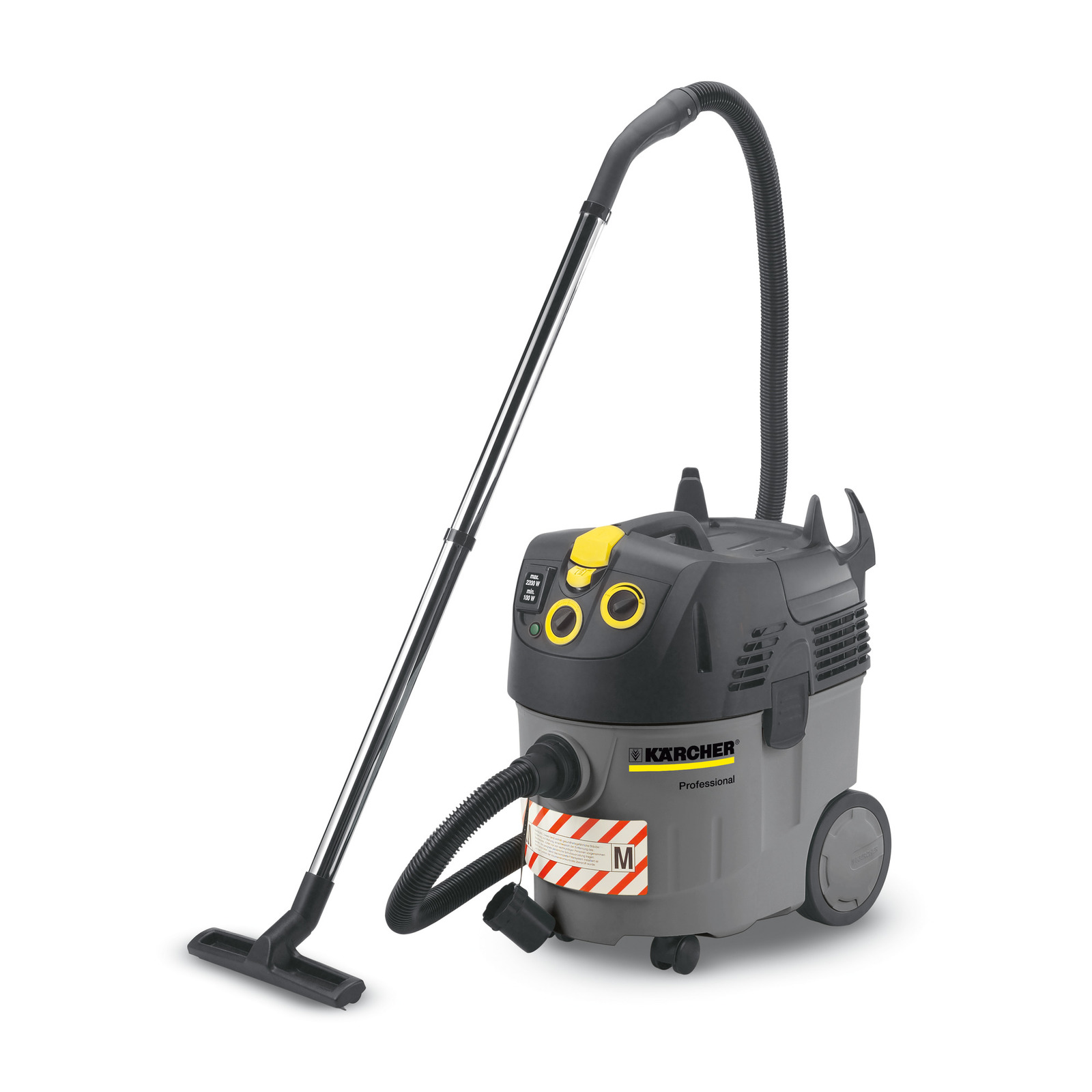 Kärcher professional vacuum cleaner with a grey body, yellow controls, and a black hose and nozzle. Kärcher professional vacuum cleaner with a grey body, yellow controls, and a black hose and nozzle.