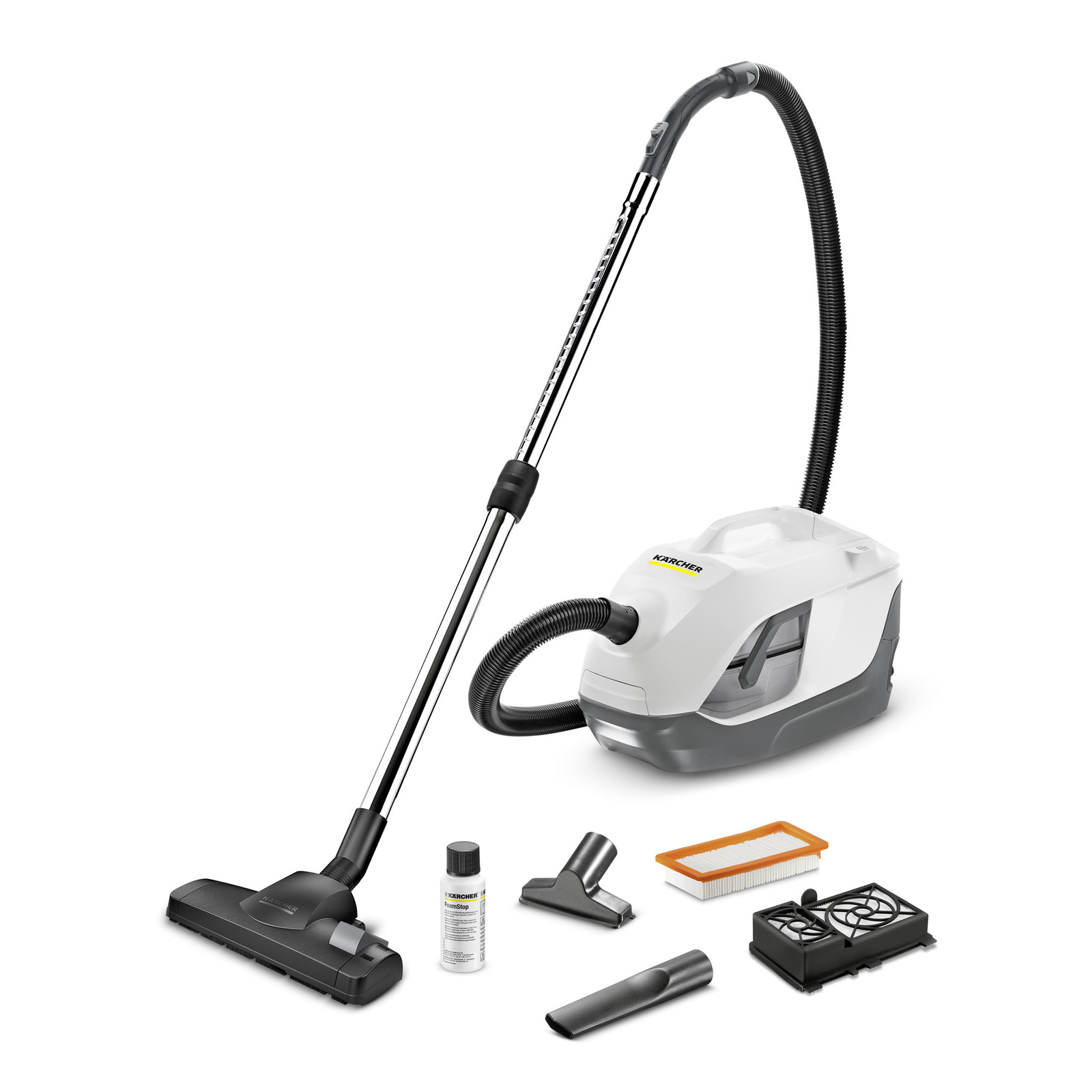 Kärcher vacuum cleaner with hose, floor nozzle, and accessories including a filter, cleaning solution, and additional nozzles.
