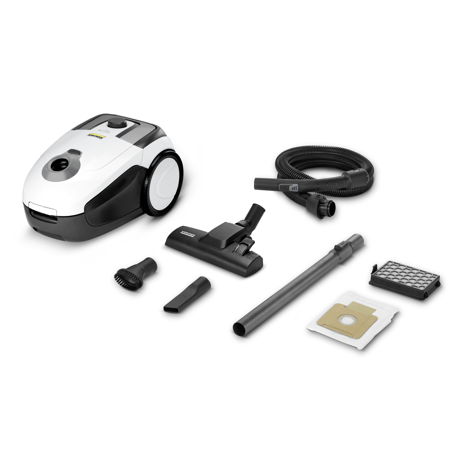 Kärcher vacuum cleaner with hose, floor nozzle, brush, crevice tool, extension tube, filter, and dust bag on white background. Kärcher vacuum cleaner with hose, floor nozzle, brush, crevice tool, extension tube, filter, and dust bag on white background.