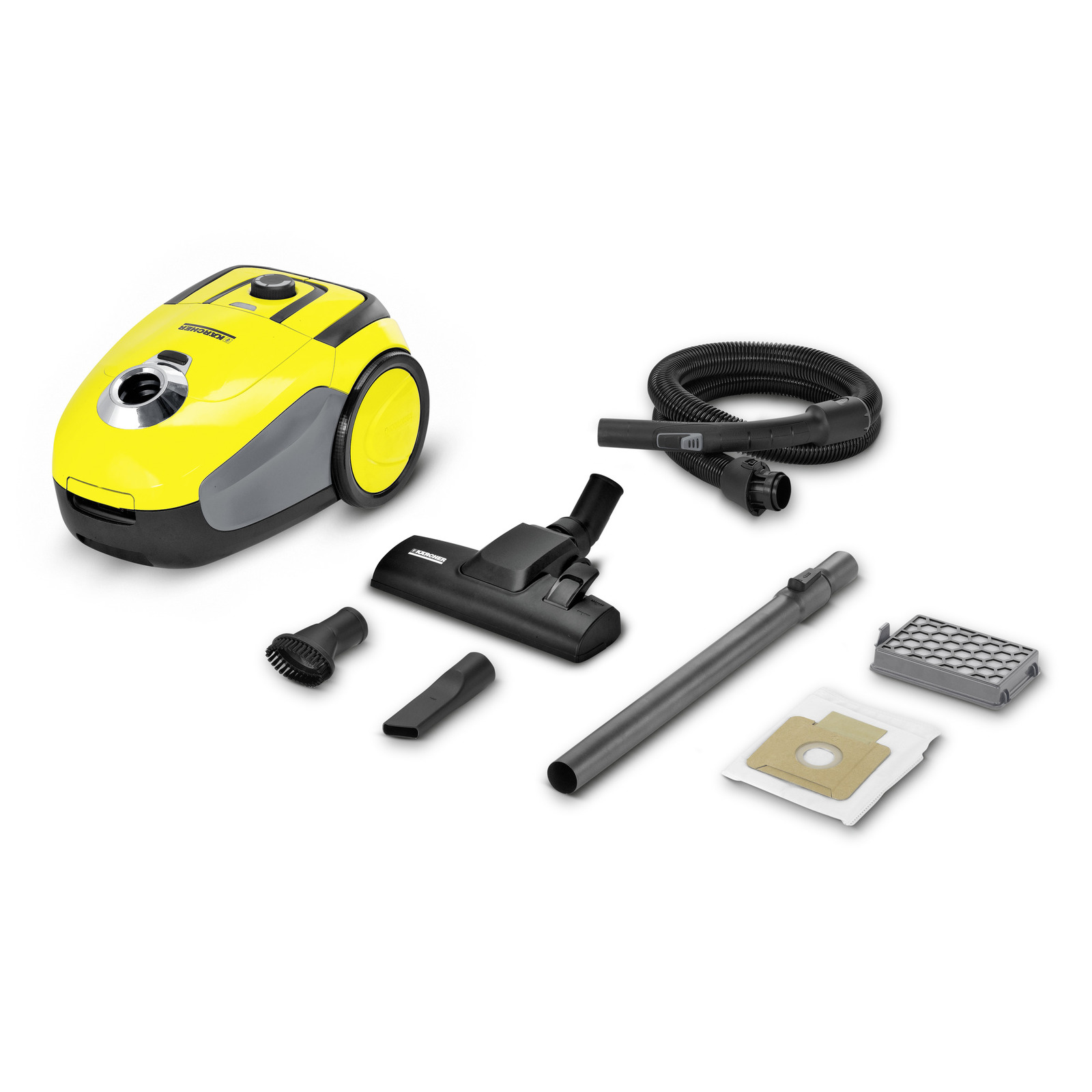 Yellow Kärcher vacuum cleaner with hose, floor nozzle, extension tube, dust bag, filter, and additional attachments. Yellow Kärcher vacuum cleaner with hose, floor nozzle, extension tube, dust bag, filter, and additional attachments.
