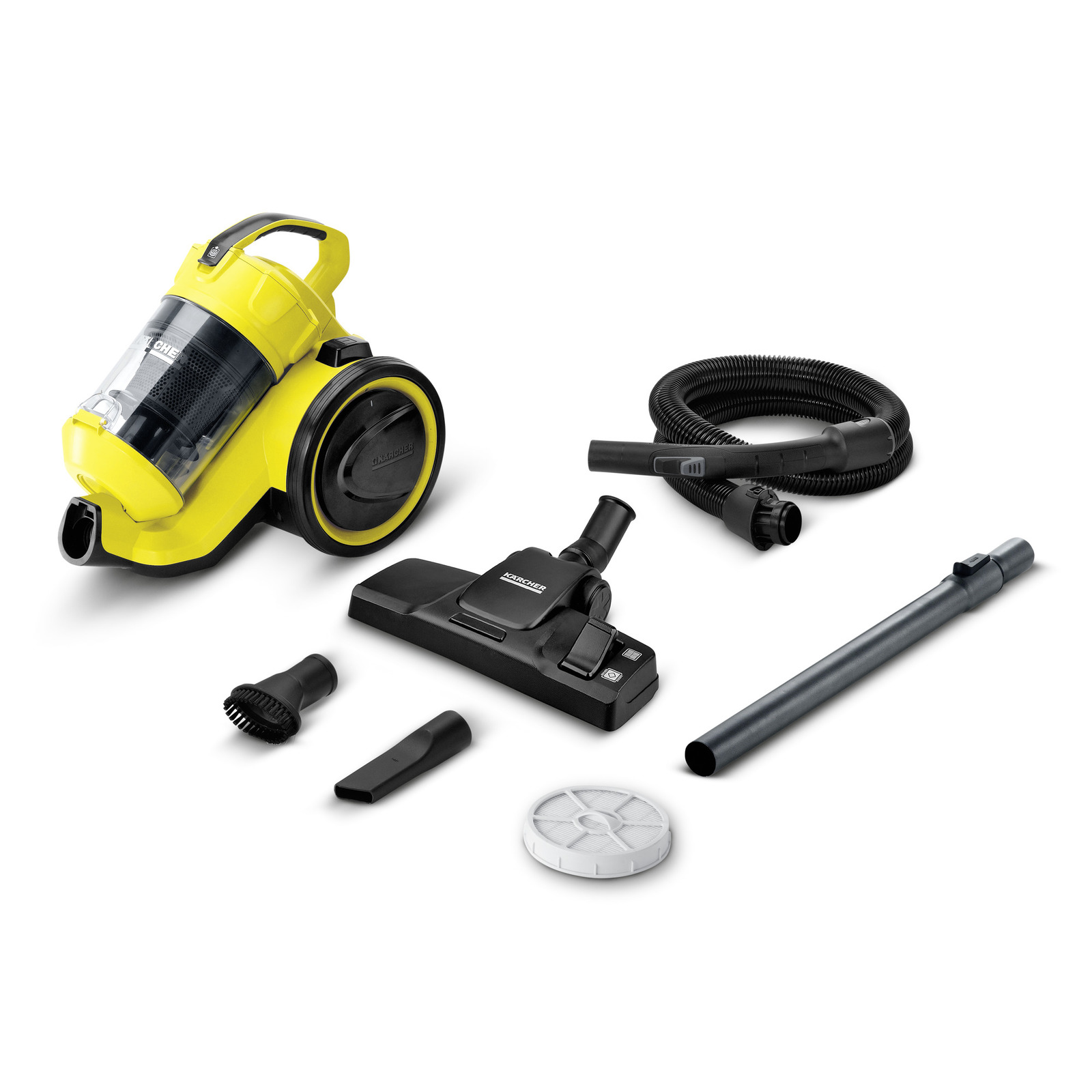 Yellow Kärcher vacuum cleaner with accessories: hose, floor nozzle, brush, crevice tool, extension tube, and filter on white background. Yellow Kärcher vacuum cleaner with accessories: hose, floor nozzle, brush, crevice tool, extension tube, and filter on white background.