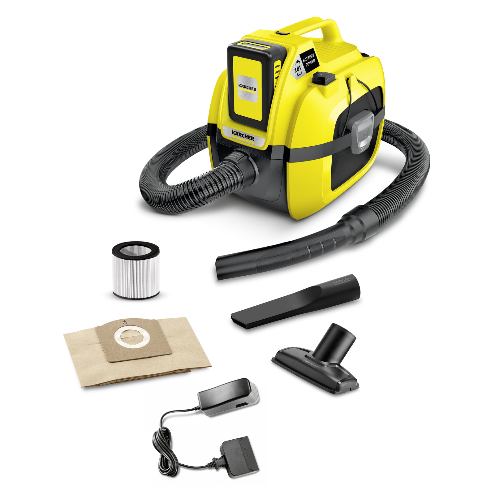 Yellow Kärcher vacuum cleaner with hose, filter, dust bag, nozzle attachments, and charger displayed on a white background.