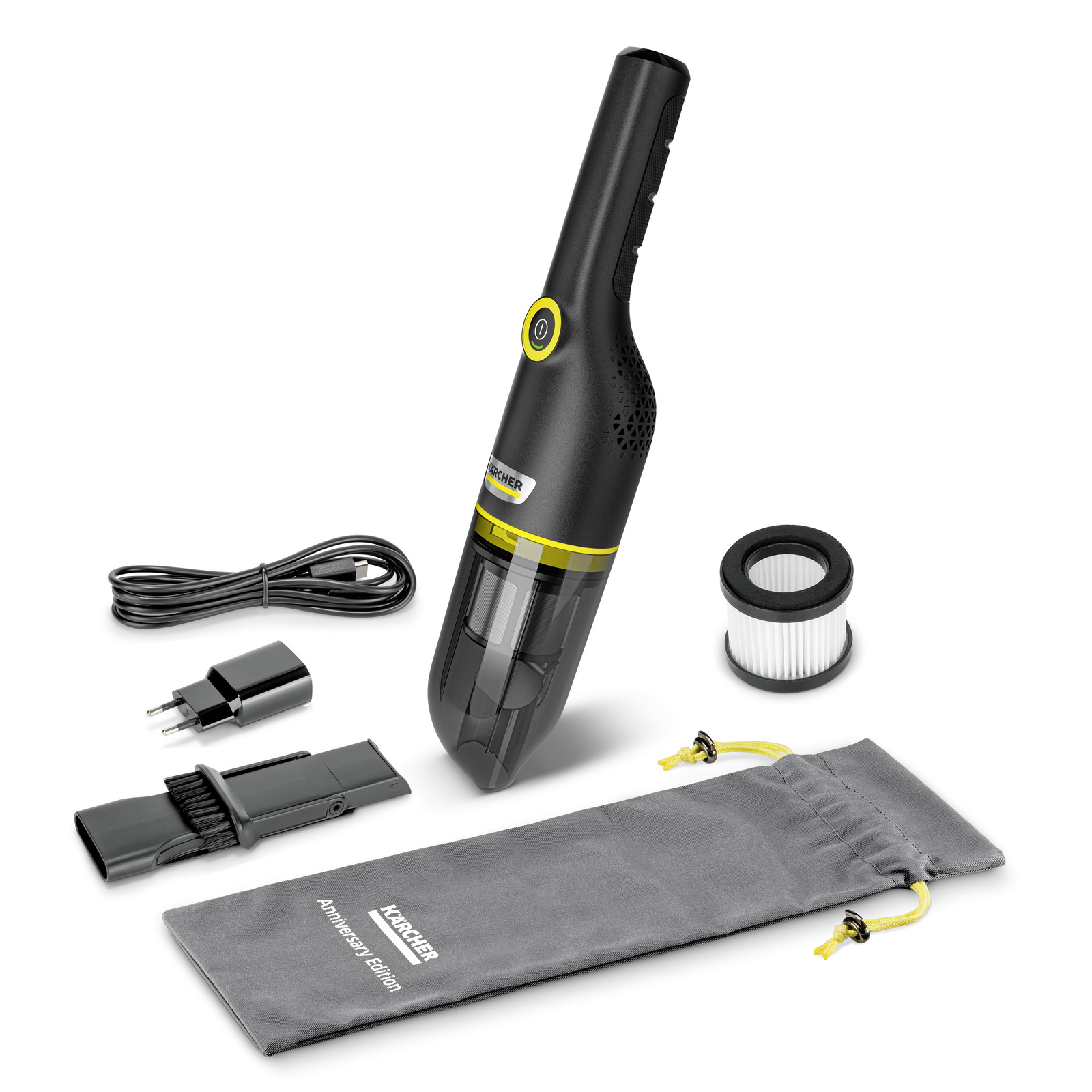 Kärcher handheld vacuum cleaner with accessories: filter, brush attachment, charging cable, plug, and storage bag. Kärcher handheld vacuum cleaner with accessories: filter, brush attachment, charging cable, plug, and storage bag.