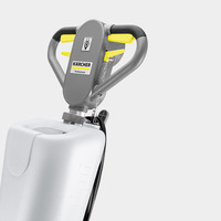 Kärcher professional cleaning machine handle with yellow grips, attached to a white tank.