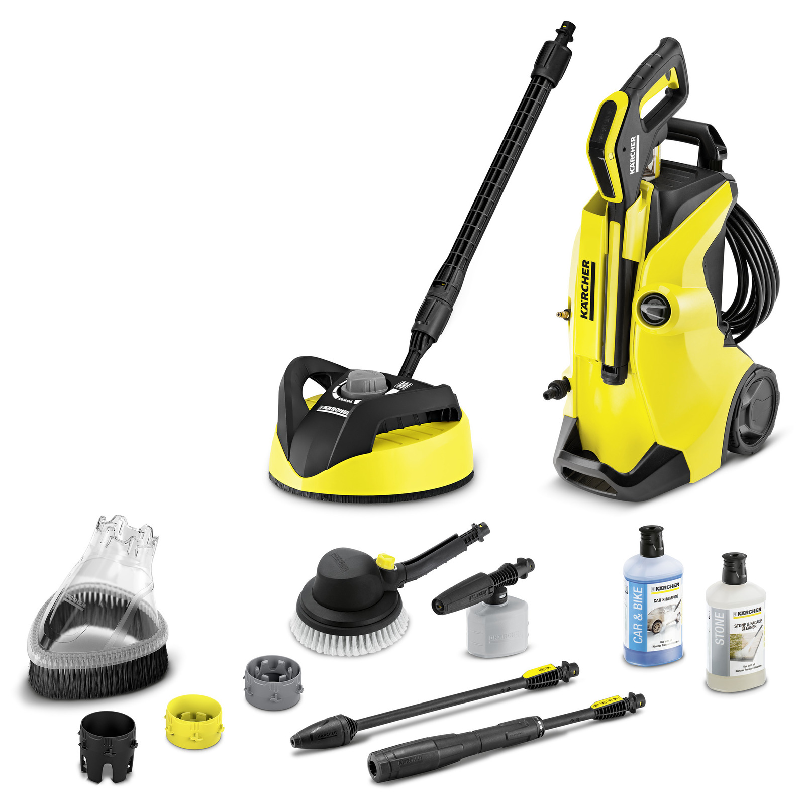 Kärcher high-pressure cleaner with accessories including brushes, nozzles, and cleaning solutions, all in yellow and black.
