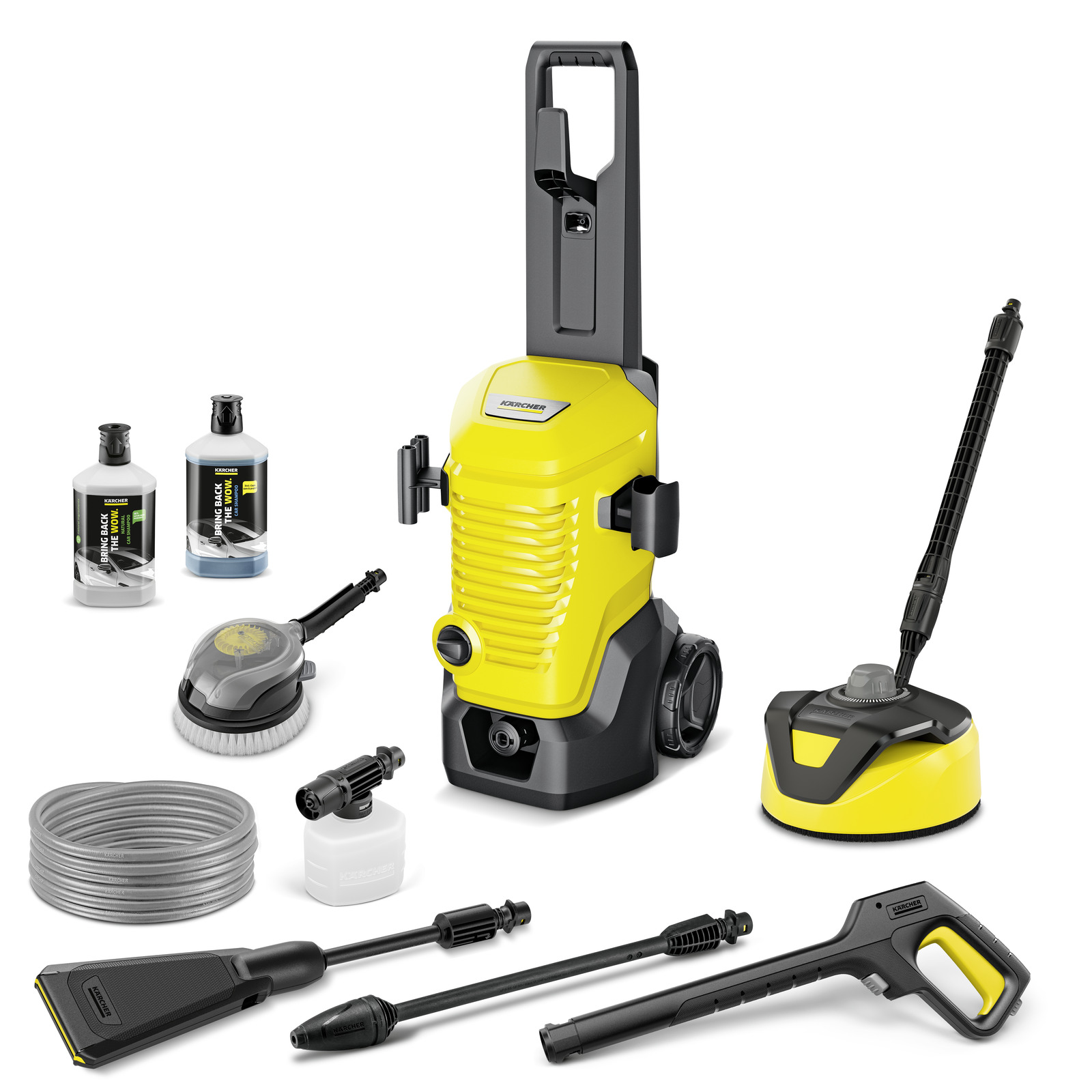 Kärcher high-pressure cleaner with accessories including detergent bottles, hose, spray gun, and surface cleaner, all on a white background.