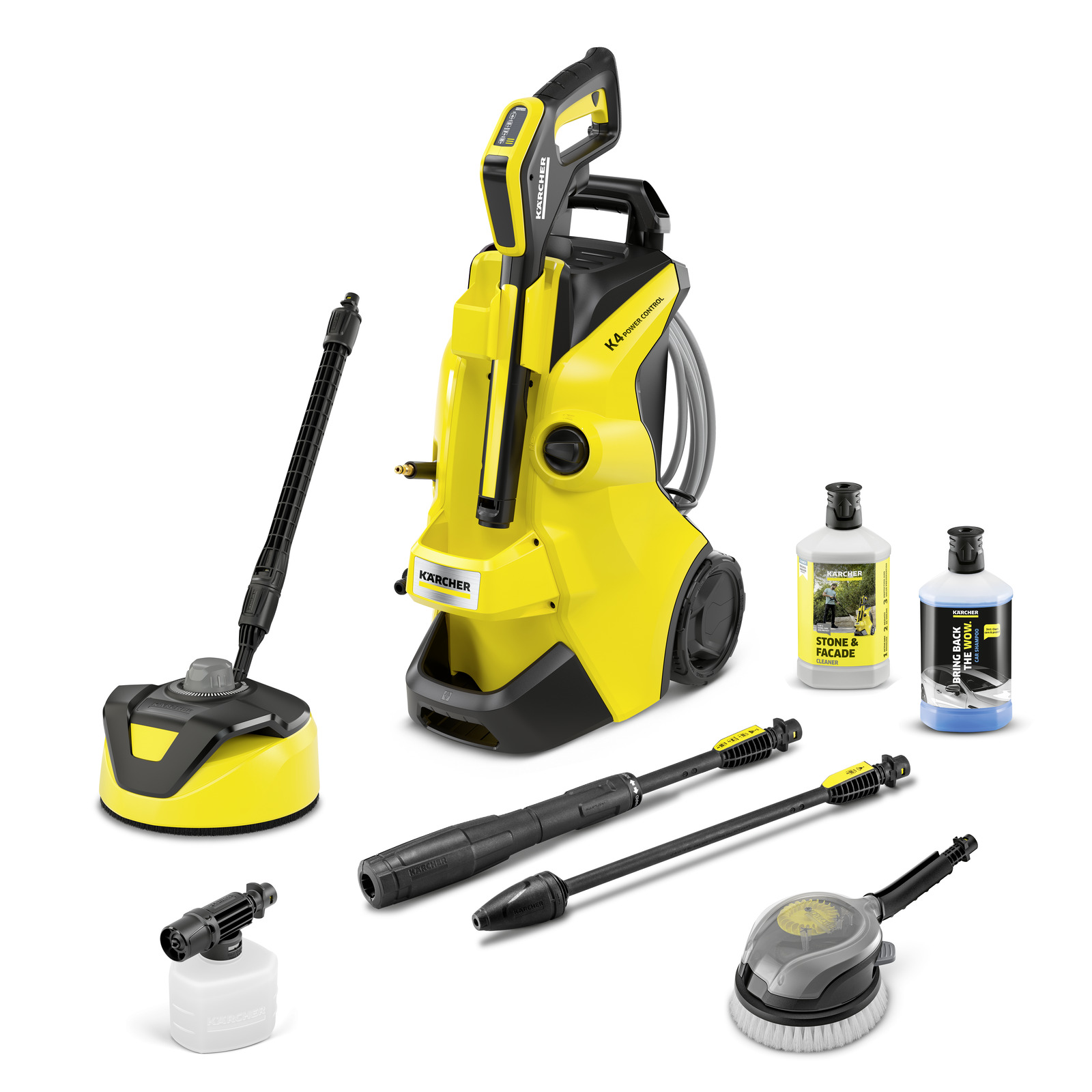 Kärcher K4 high-pressure cleaner with accessories, including a surface cleaner, two detergent bottles, and various nozzles.