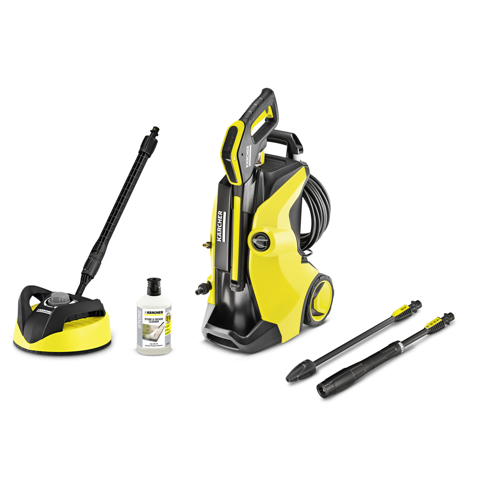 Kärcher high-pressure cleaner with accessories: surface cleaner, detergent bottle, and two spray lances.