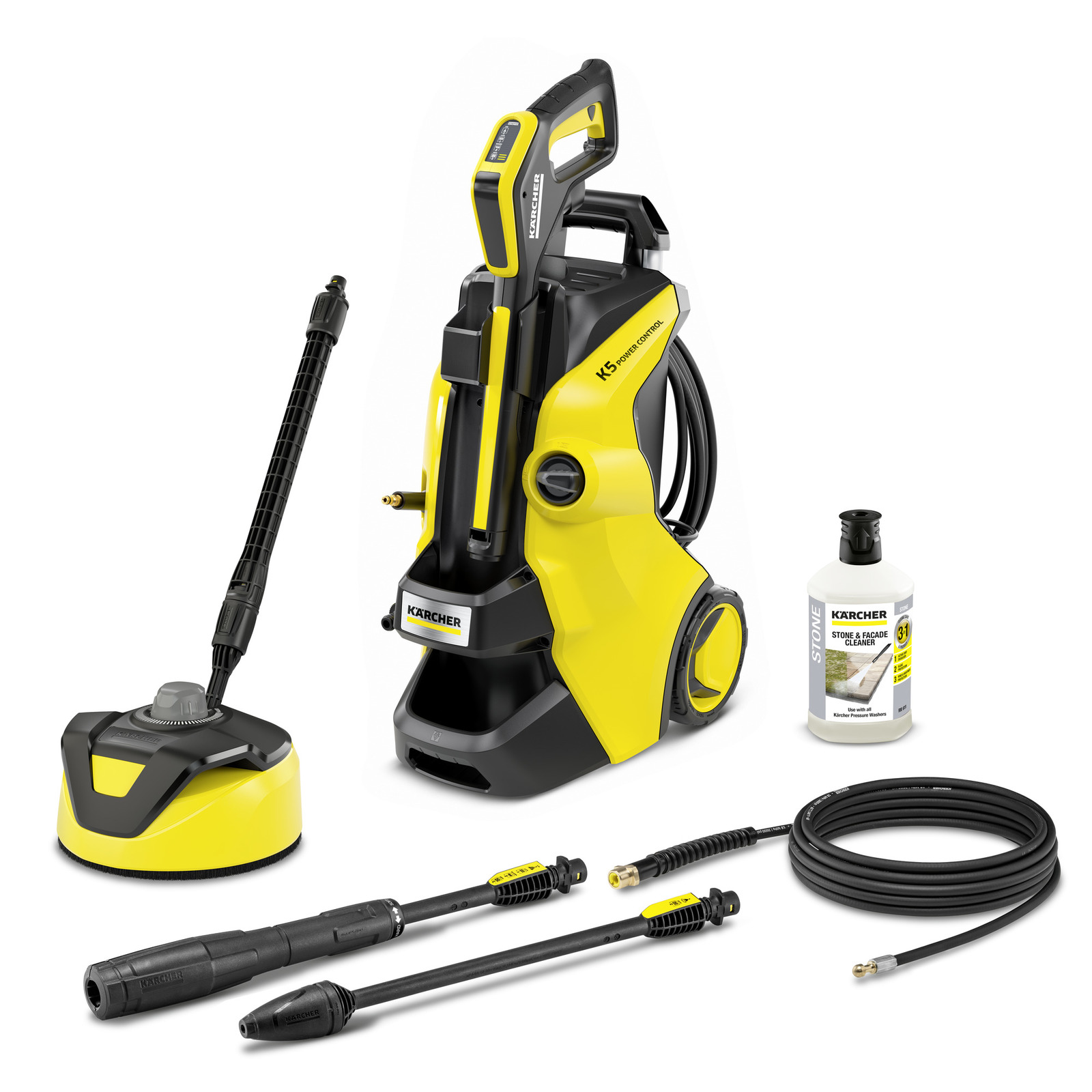 Kärcher K5 high-pressure cleaner with accessories, including spray gun, hose, surface cleaner, and detergent bottle.