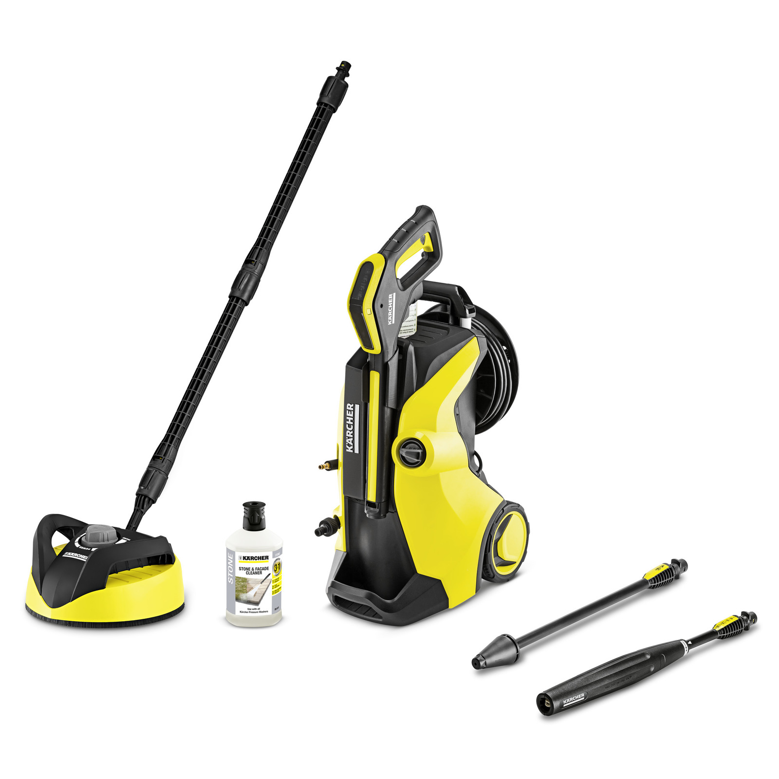 Kärcher high-pressure cleaner with accessories, including a surface cleaner, detergent bottle, and two spray lances.
