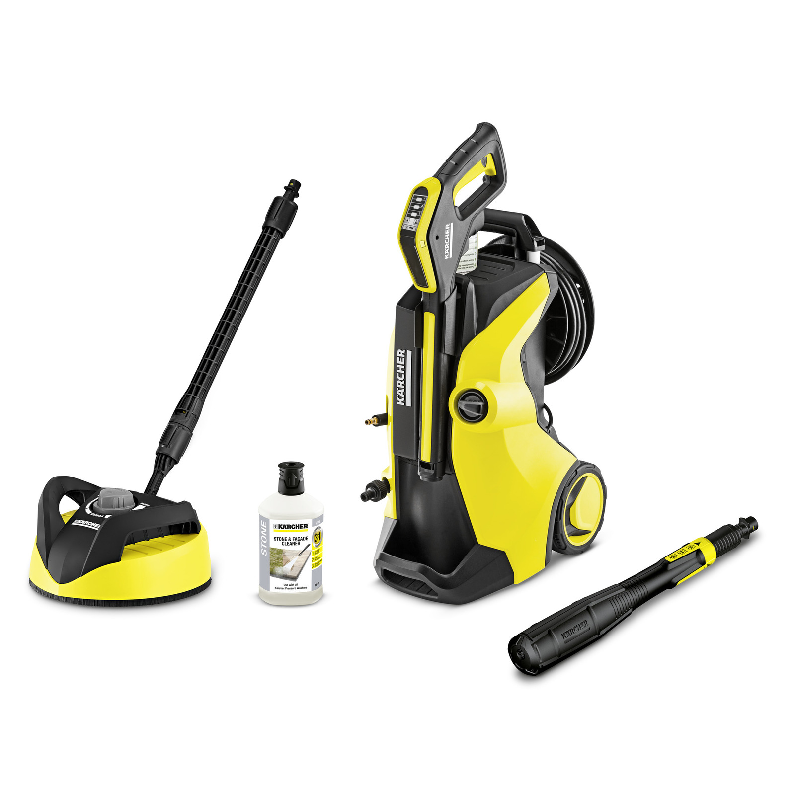 Kärcher high-pressure cleaner with accessories: surface cleaner, stone cleaner bottle, and spray lance, all in yellow and black.