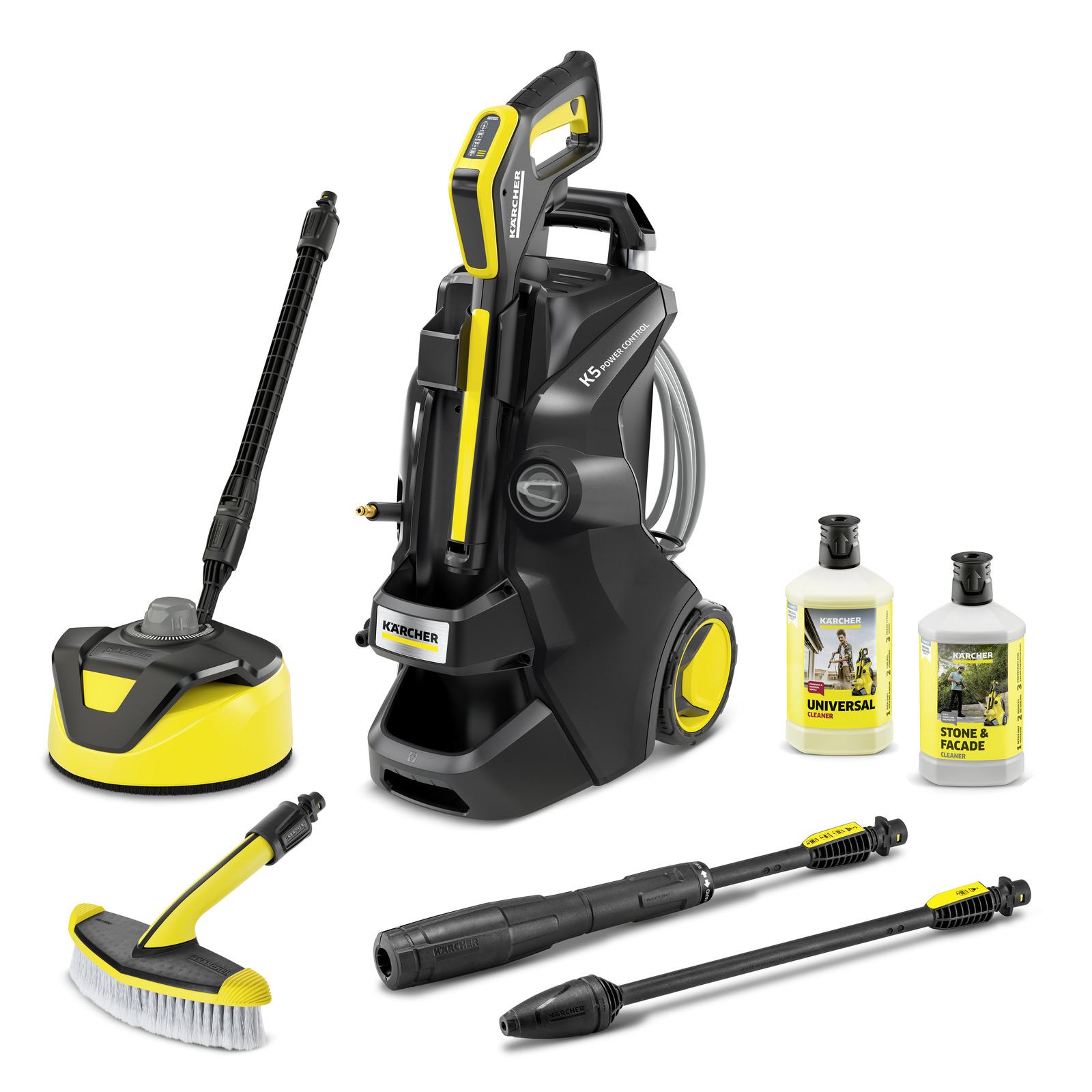 Kärcher K5 pressure washer with accessories, including surface cleaner, brush, two nozzles, and two detergent bottles. Kärcher K5 pressure washer with accessories, including surface cleaner, brush, two nozzles, and two detergent bottles.