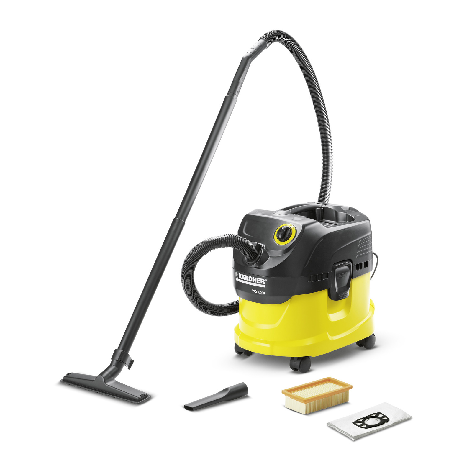 Kärcher WD 7.000 vacuum cleaner with hose, floor nozzle, crevice tool, filter, and dust bag on white background.