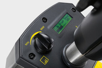 Close-up of a Kärcher control panel with a dial for brush speed adjustment and a digital display showing side brush speed at 80%.