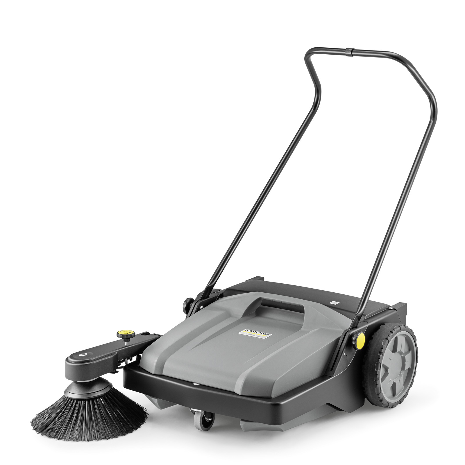 Kärcher push sweeper with large wheels, black bristle brush, and a grey body, featuring a handle for manual operation.