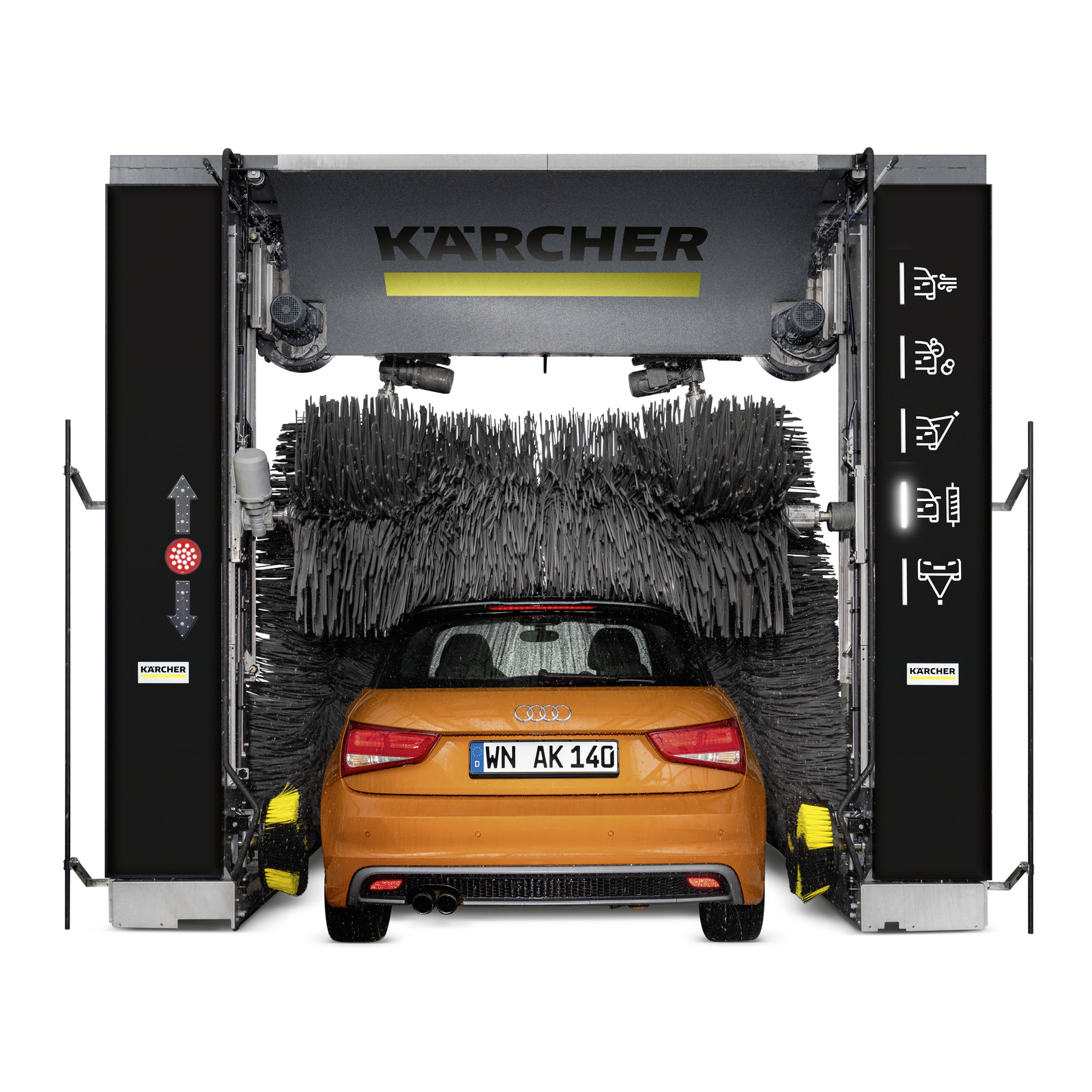 Orange Audi car inside a Kärcher car wash system, surrounded by rotating brushes, with Kärcher branding visible above. Orange Audi car inside a Kärcher car wash system, surrounded by rotating brushes, with Kärcher branding visible above.
