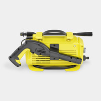 Yellow Kärcher high-pressure cleaner with black handle and hose, set against a plain white background.