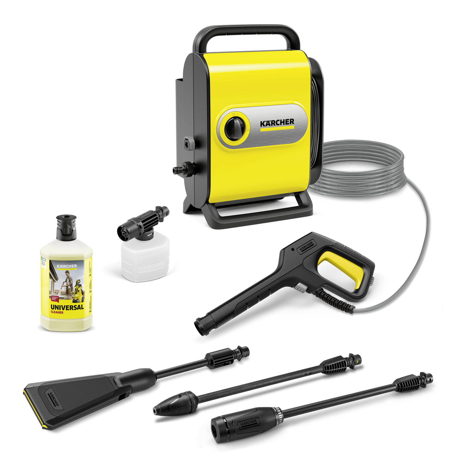 Kärcher high-pressure cleaner set with hose, spray gun, detergent bottle, and various nozzles on a white background.