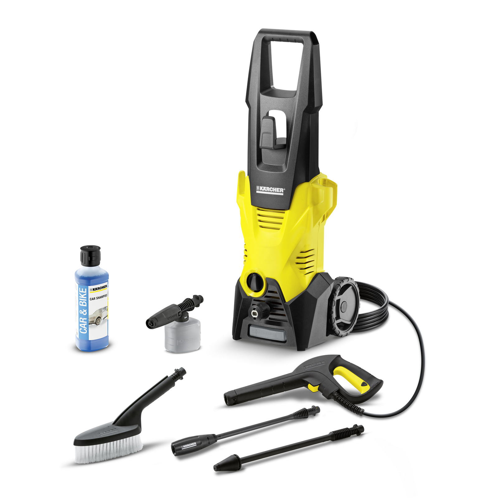 Kärcher hogedrukreiniger met accessoires: borstel, spuitpistool, lans, shampoo en schuimkop.