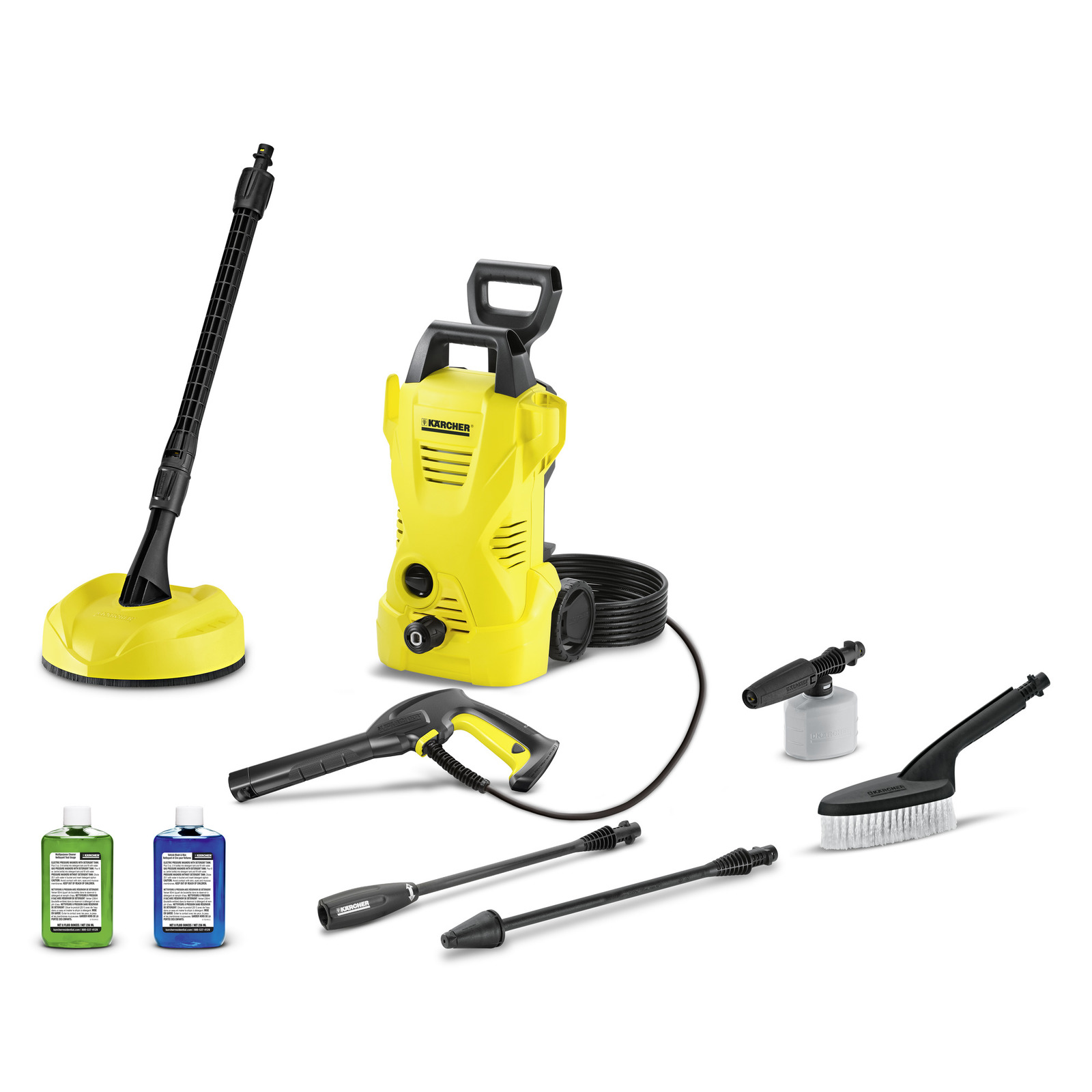 Kärcher high-pressure cleaner with accessories: surface cleaner, spray gun, detergent bottles, brush, and extension wands. Kärcher high-pressure cleaner with accessories: surface cleaner, spray gun, detergent bottles, brush, and extension wands.