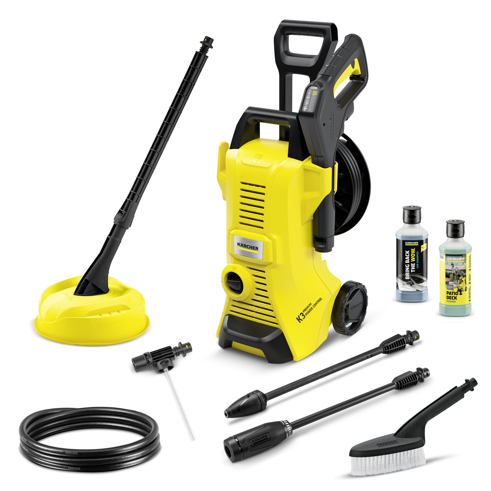 Kärcher high-pressure cleaner accompanied by a surface cleaner attachment, two spray lances, a washing brush, a hose, a nozzle adapter, and two bottles of cleaning detergent against a white background. Kärcher high-pressure cleaner accompanied by a surface cleaner attachment, two spray lances, a washing brush, a hose, a nozzle adapter, and two bottles of cleaning detergent against a white background.
