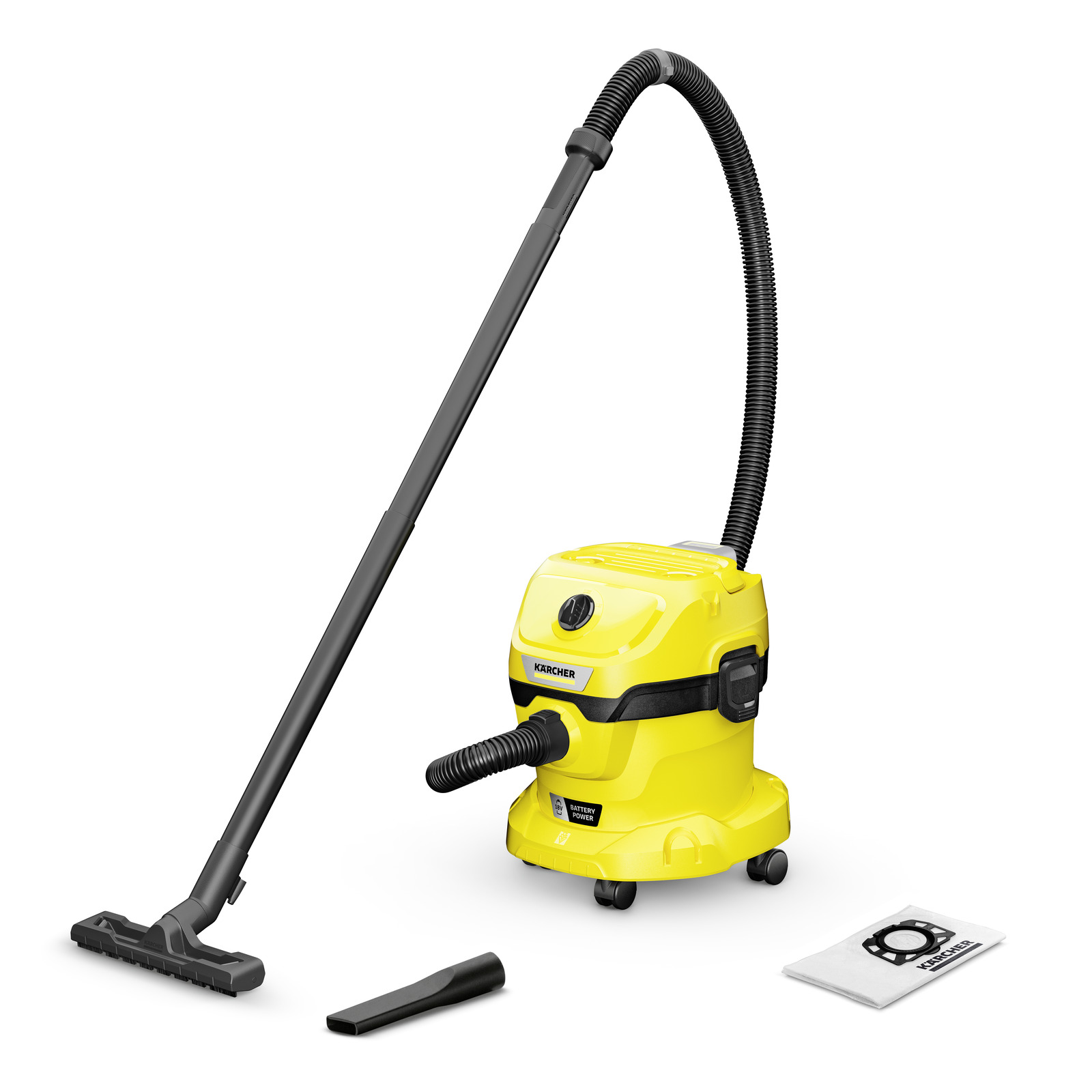 Yellow Kärcher wet and dry vacuum cleaner with hose, floor nozzle, crevice tool, and filter bag on white background. Yellow Kärcher wet and dry vacuum cleaner with hose, floor nozzle, crevice tool, and filter bag on white background.