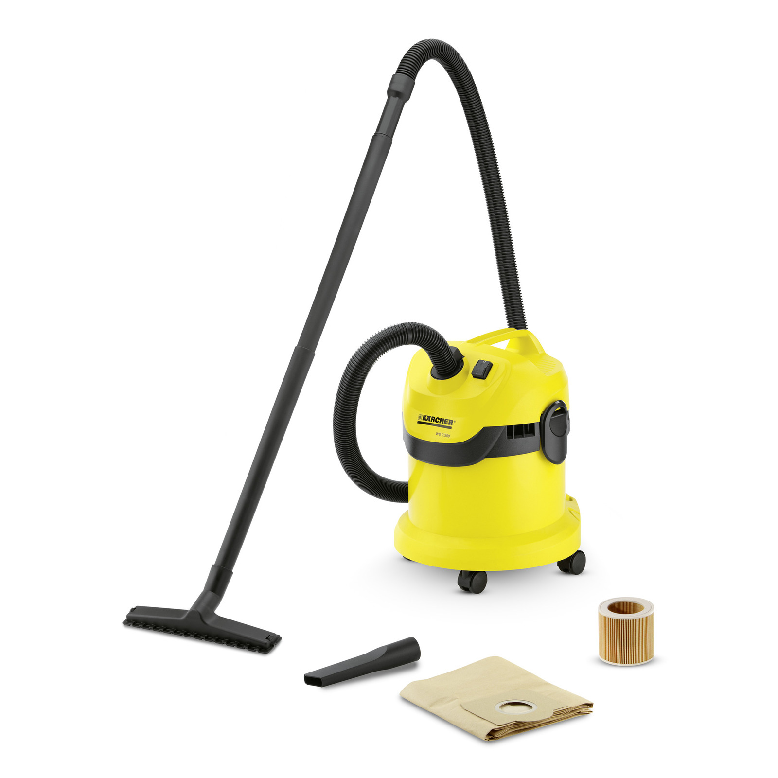 Yellow Kärcher wet and dry vacuum cleaner with hose, floor nozzle, crevice tool, filter, and dust bag on white background.