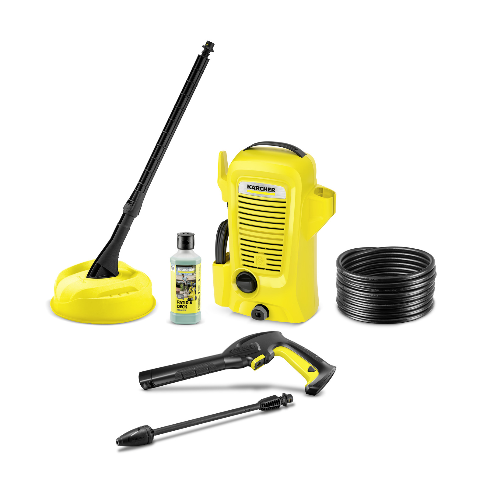 Kärcher high-pressure cleaner set with surface cleaner, detergent bottle, hose, spray gun, and lance, all in yellow and black.