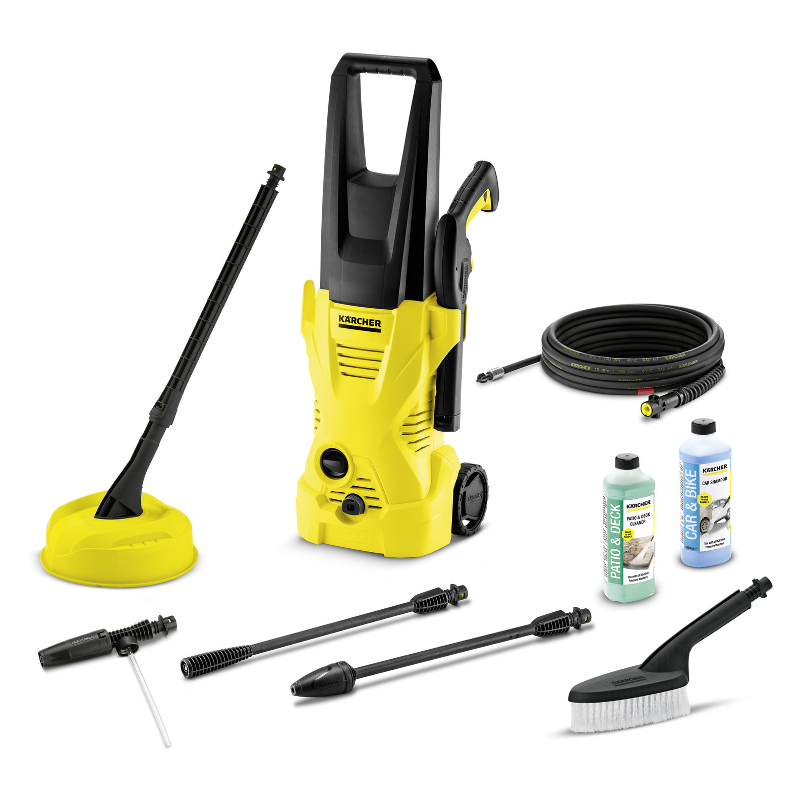 Kärcher high-pressure cleaner with accessories: hose, patio cleaner, brush, two detergent bottles, and various nozzles. Kärcher high-pressure cleaner with accessories: hose, patio cleaner, brush, two detergent bottles, and various nozzles.