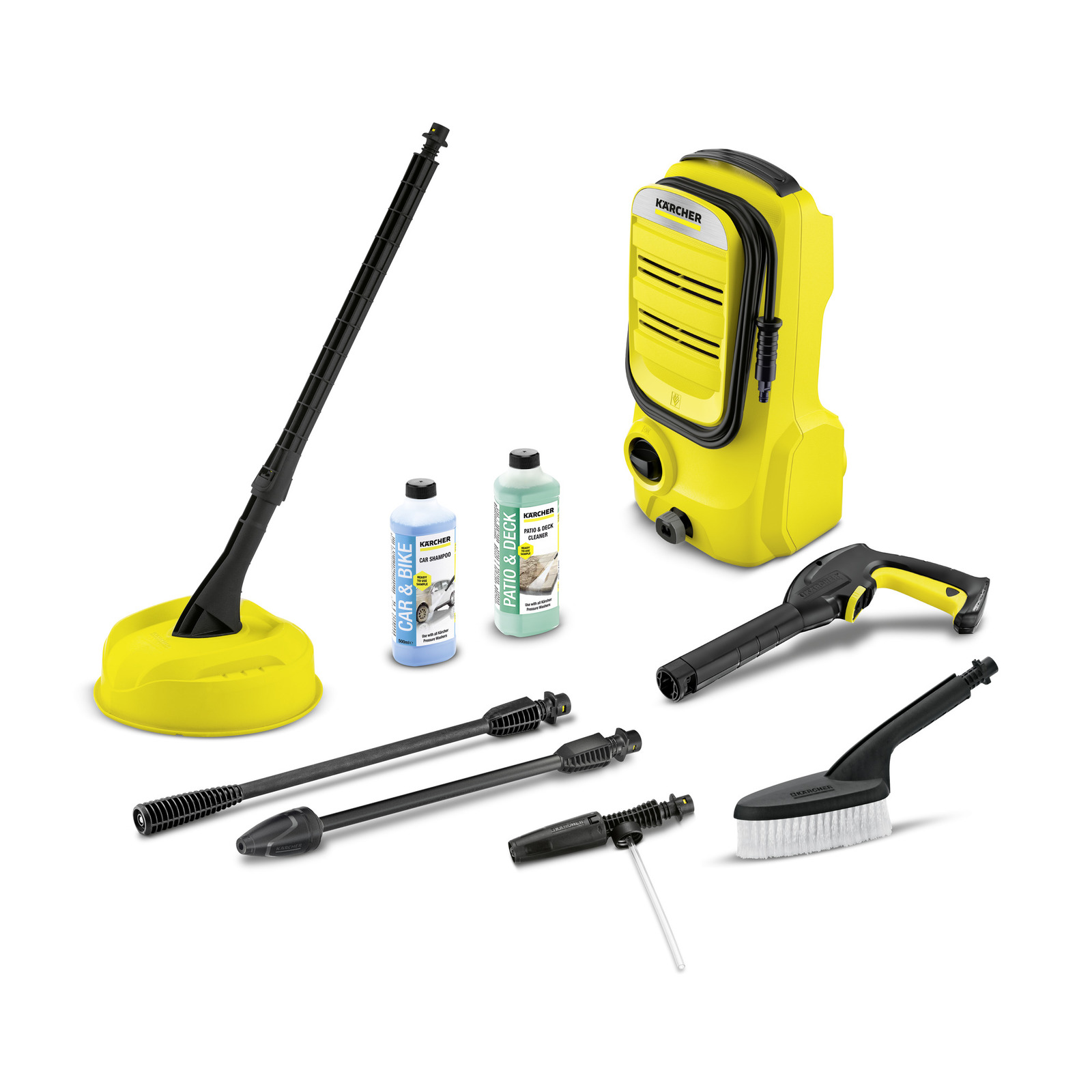 Kärcher high-pressure cleaner set with accessories, including detergent bottles, nozzles, and a brush, all in yellow and black. Kärcher high-pressure cleaner set with accessories, including detergent bottles, nozzles, and a brush, all in yellow and black.