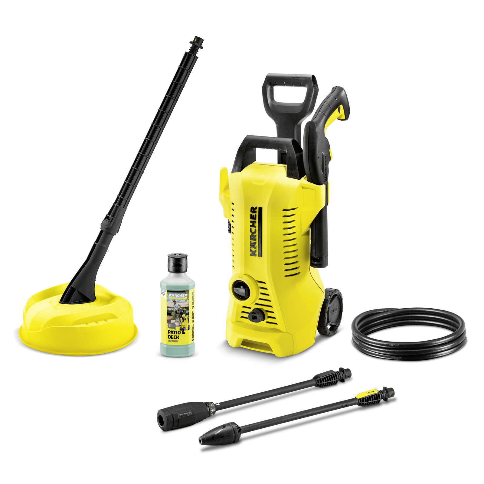 Kärcher high-pressure cleaner with accessories: patio cleaner, detergent bottle, hose, and two spray lances. Kärcher high-pressure cleaner with accessories: patio cleaner, detergent bottle, hose, and two spray lances.