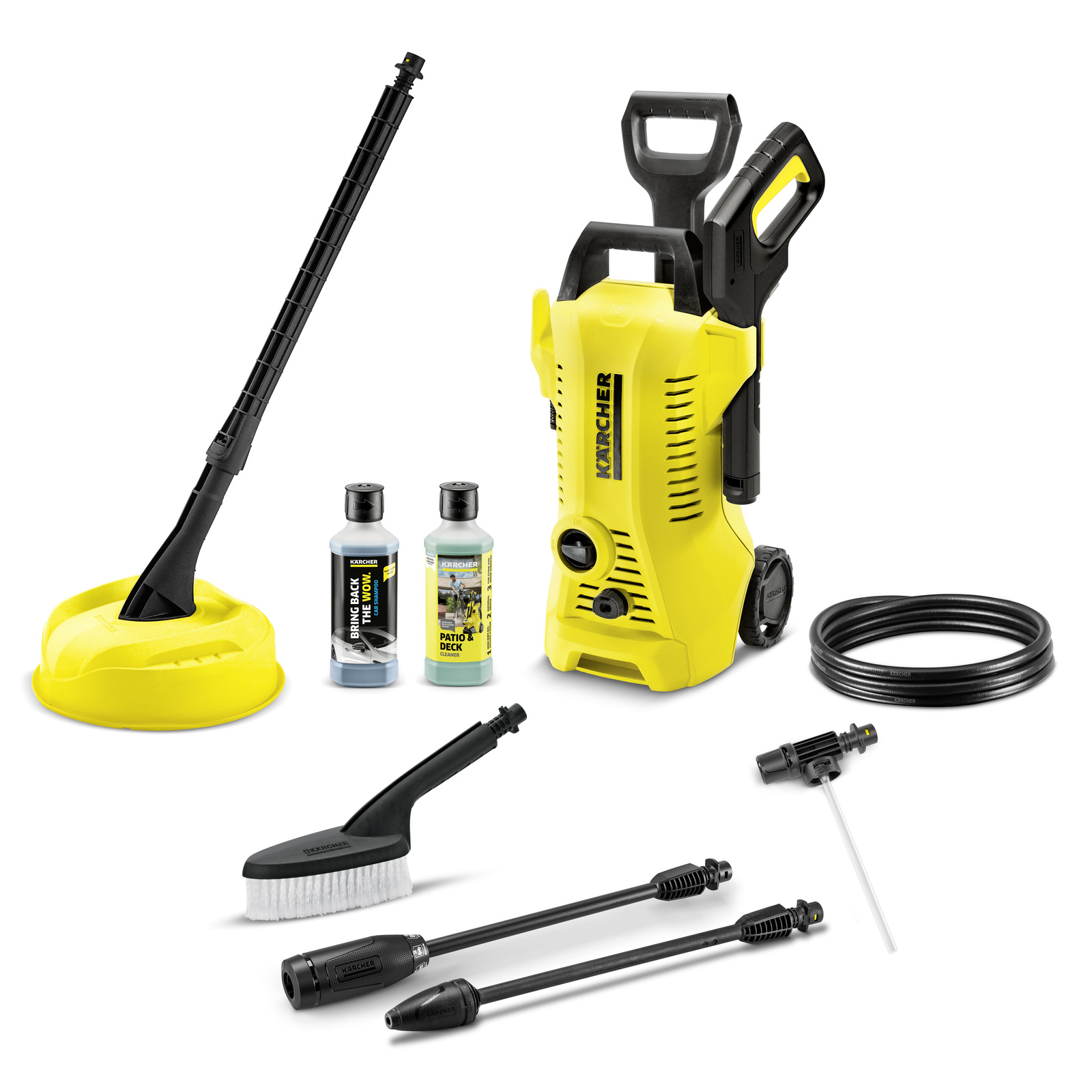 Kärcher high-pressure cleaner set with accessories, including detergent bottles, hose, brush, and nozzles on a white background. Kärcher high-pressure cleaner set with accessories, including detergent bottles, hose, brush, and nozzles on a white background.