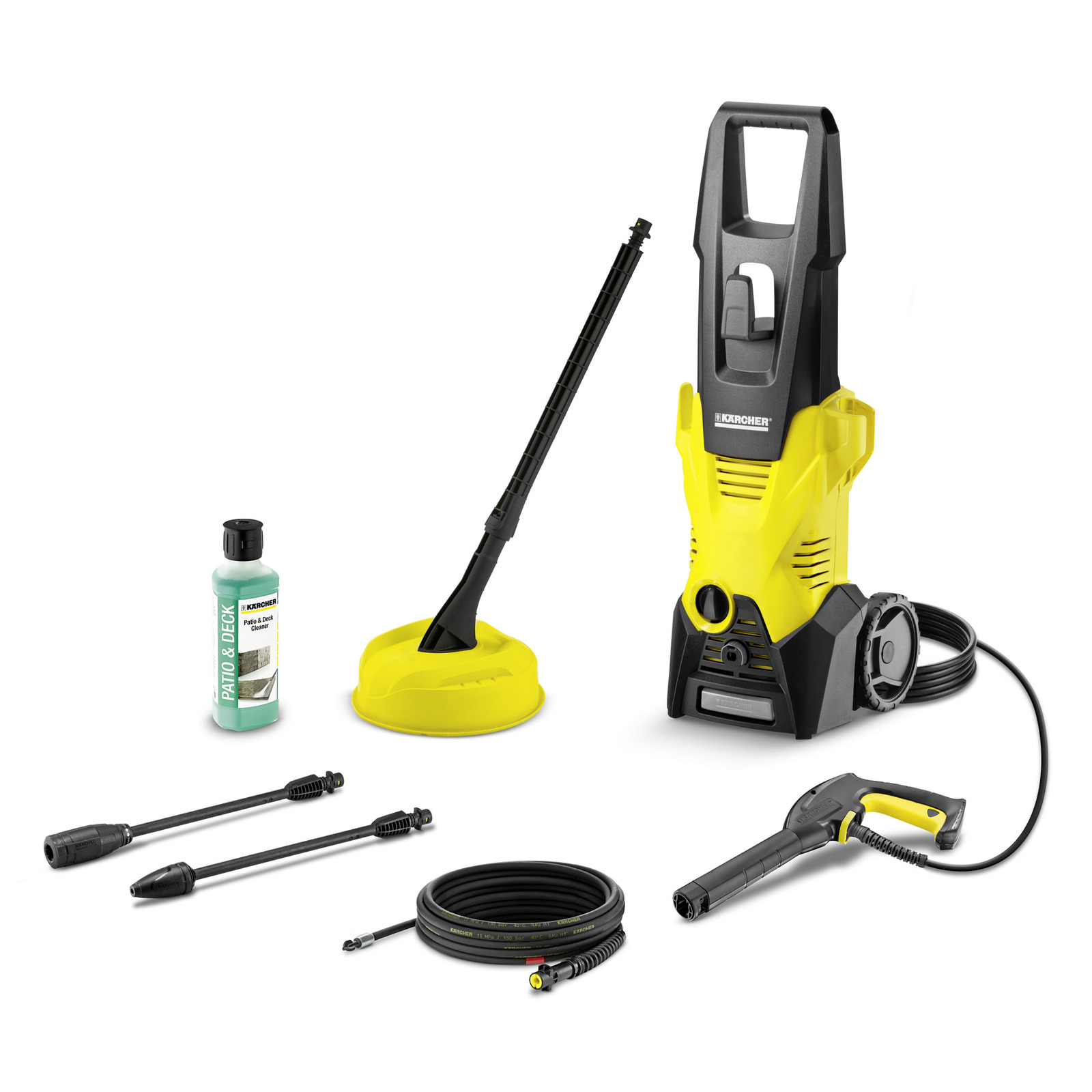 Kärcher high-pressure cleaner with accessories: patio cleaner, detergent bottle, spray gun, hoses, and nozzles on white background.