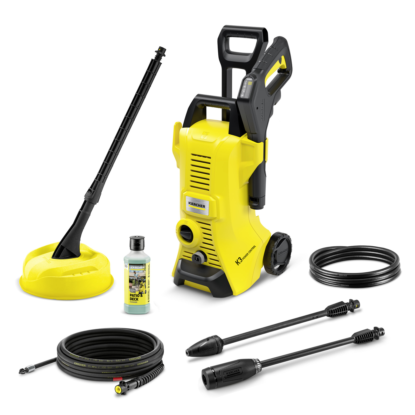 Kärcher K3 high-pressure cleaner with accessories: surface cleaner, detergent bottle, hose, and two spray lances. Kärcher K3 high-pressure cleaner with accessories: surface cleaner, detergent bottle, hose, and two spray lances.