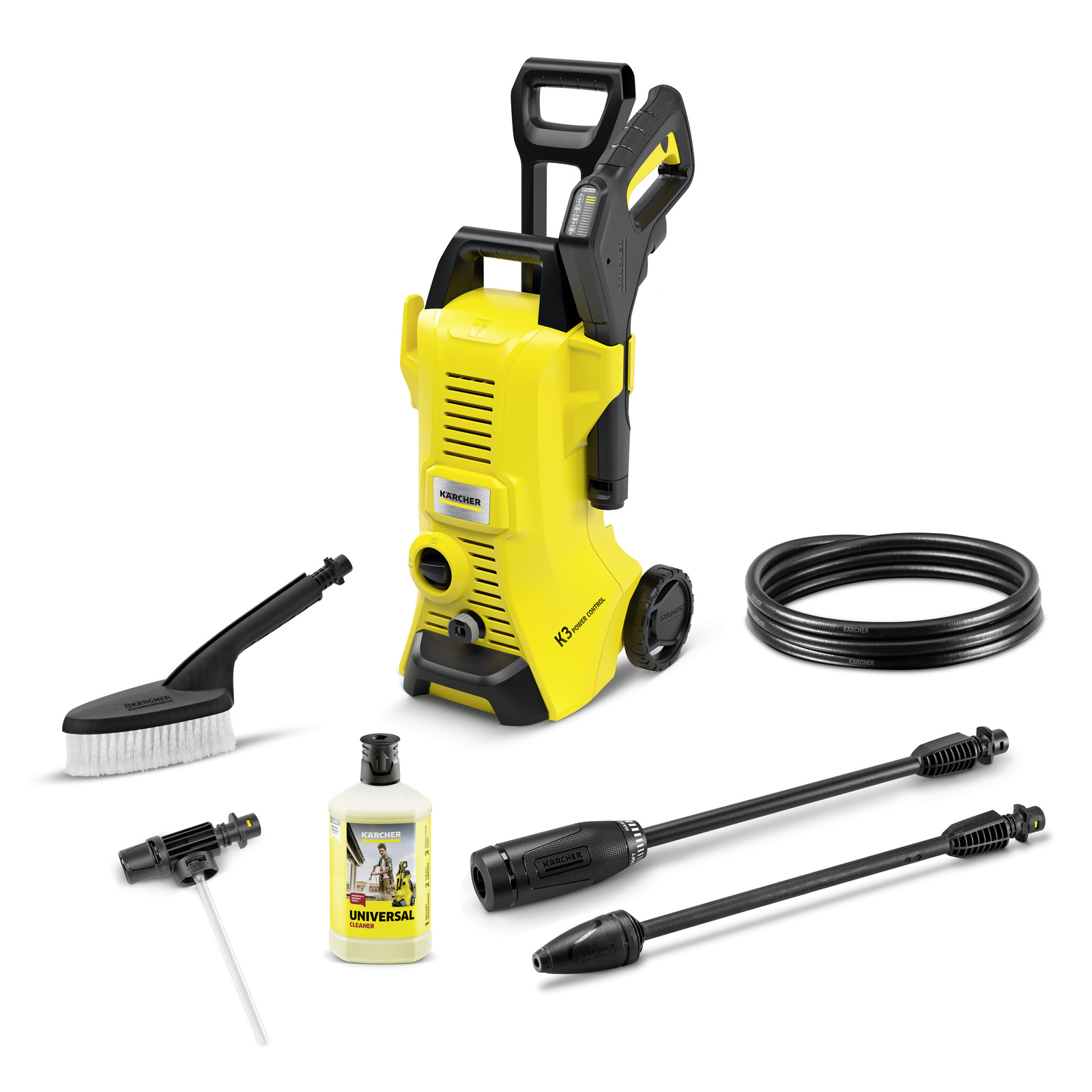Kärcher K3 high-pressure cleaner with accessories: brush, detergent bottle, hose, and two spray lances.
