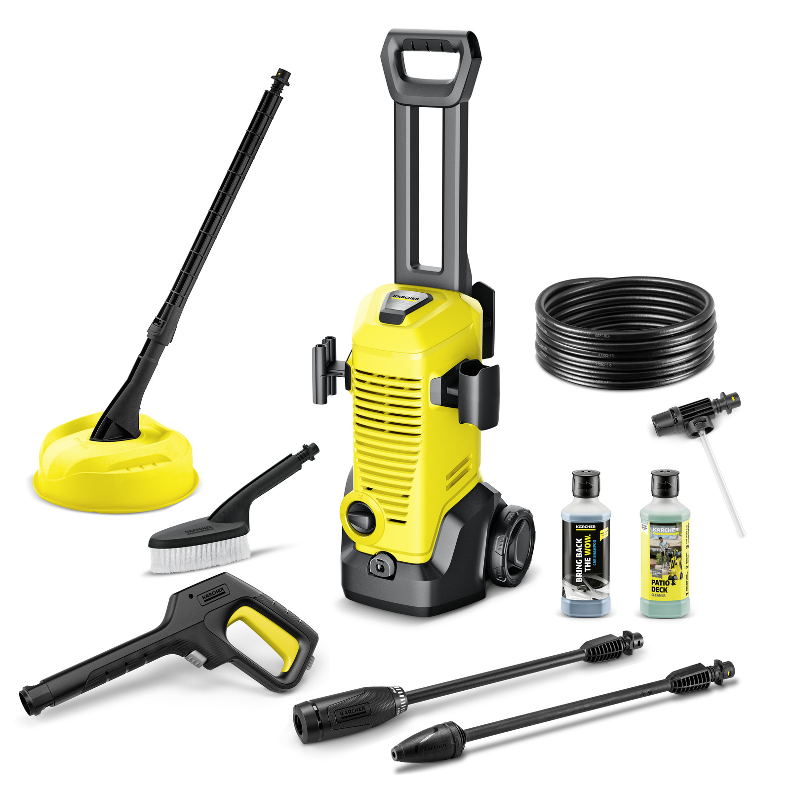Kärcher high-pressure cleaner set with accessories including a brush, hose, detergent bottles, and various nozzles.
