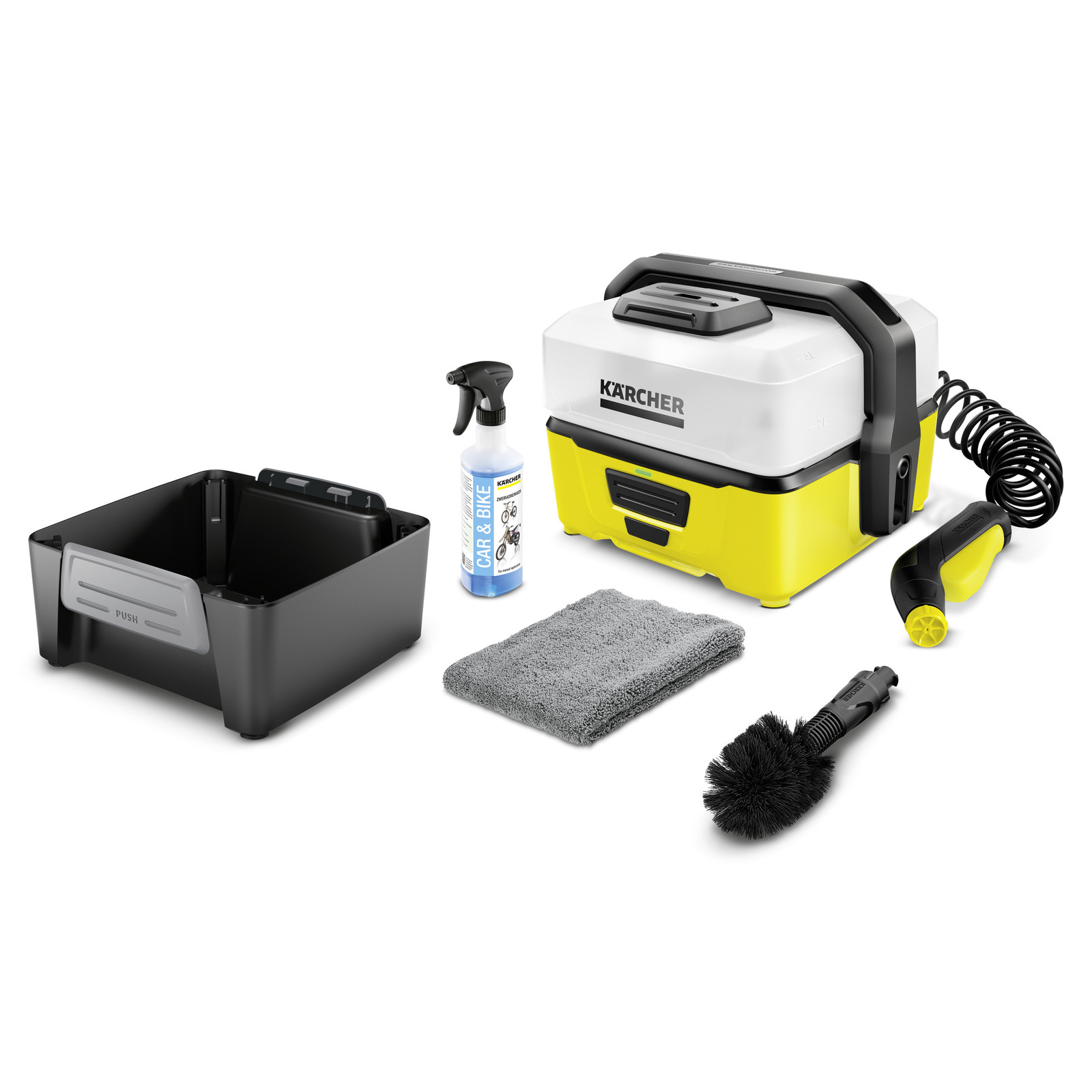 Kärcher portable cleaner set with spray bottle, brush, towel, and black container. Kärcher portable cleaner set with spray bottle, brush, towel, and black container.