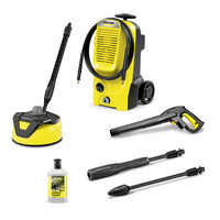 Kärcher high-pressure cleaner set with accessories including a spray gun, extension wands, surface cleaner, and cleaning detergent.