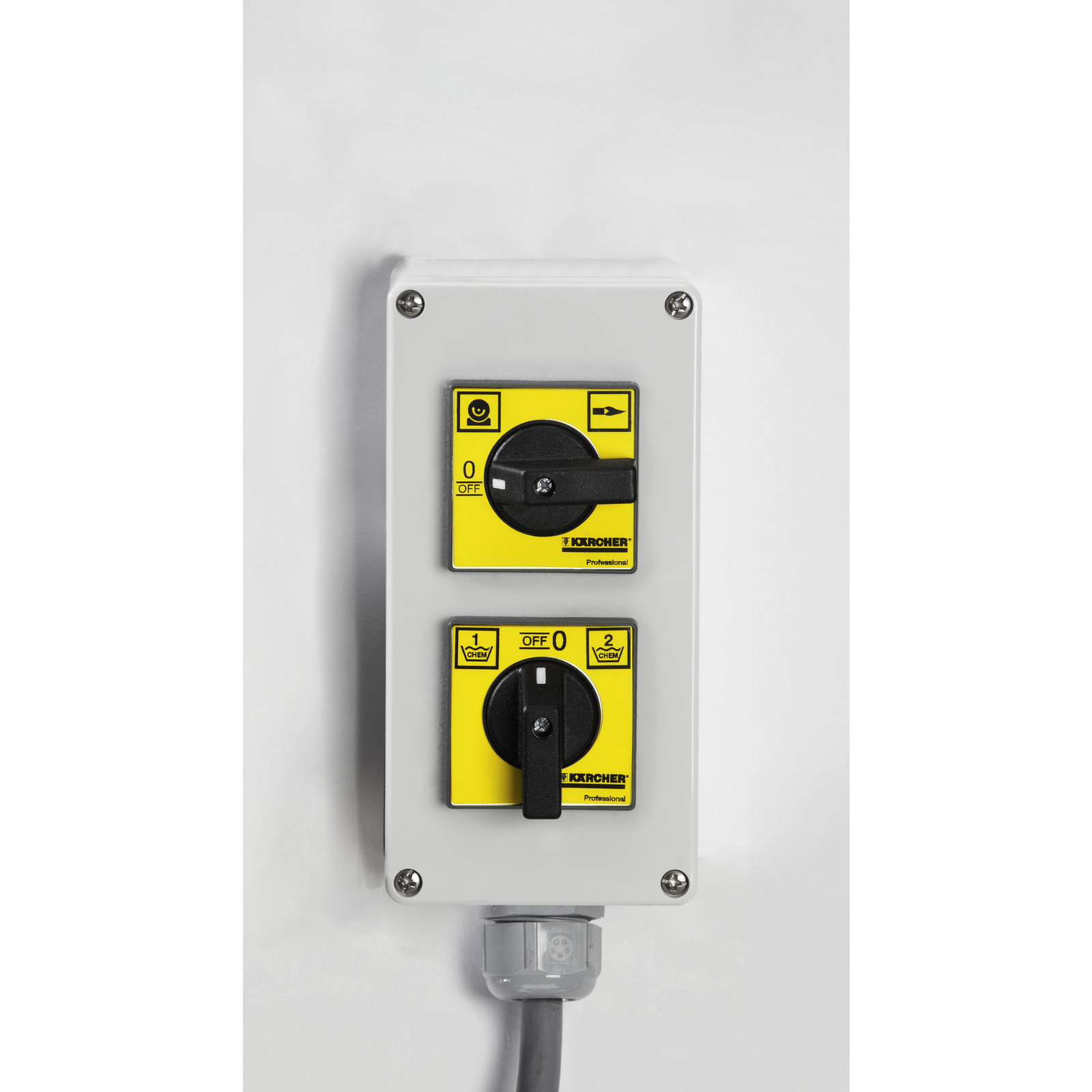 Kärcher control panel with two black switches on a white wall, featuring yellow labels and a grey cable connection. Kärcher control panel with two black switches on a white wall, featuring yellow labels and a grey cable connection.