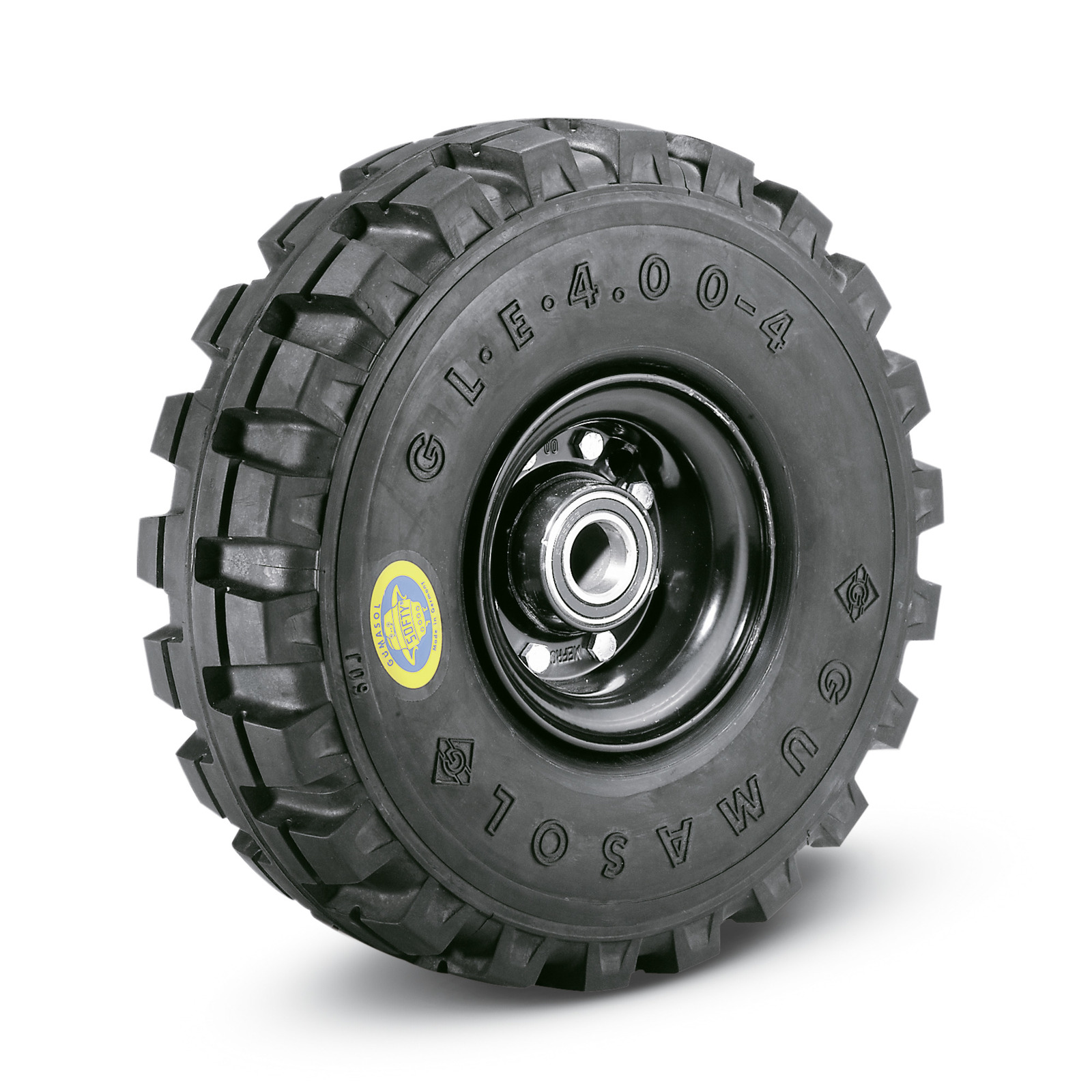 Black rubber wheel with deep treads and a metal hub, featuring "GUMASOL" and "G.L.E. 4.00-4" markings.
