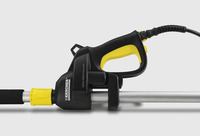 Kärcher high-pressure cleaner handle with yellow trigger and black grip, attached to a metal lance.