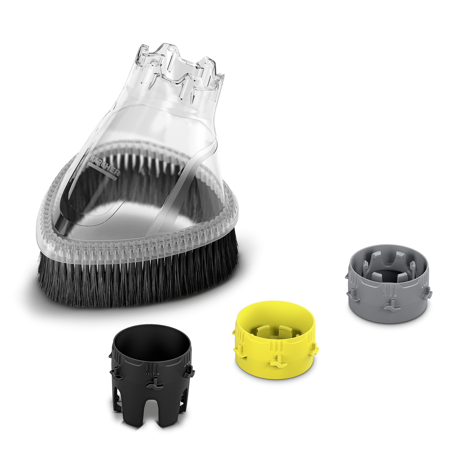 Kärcher brush attachment with transparent top and black bristles, alongside black, yellow, and grey adapters. Kärcher brush attachment with transparent top and black bristles, alongside black, yellow, and grey adapters.