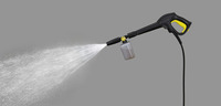 Kärcher high-pressure cleaner spraying water with attached detergent bottle, set against a grey background.