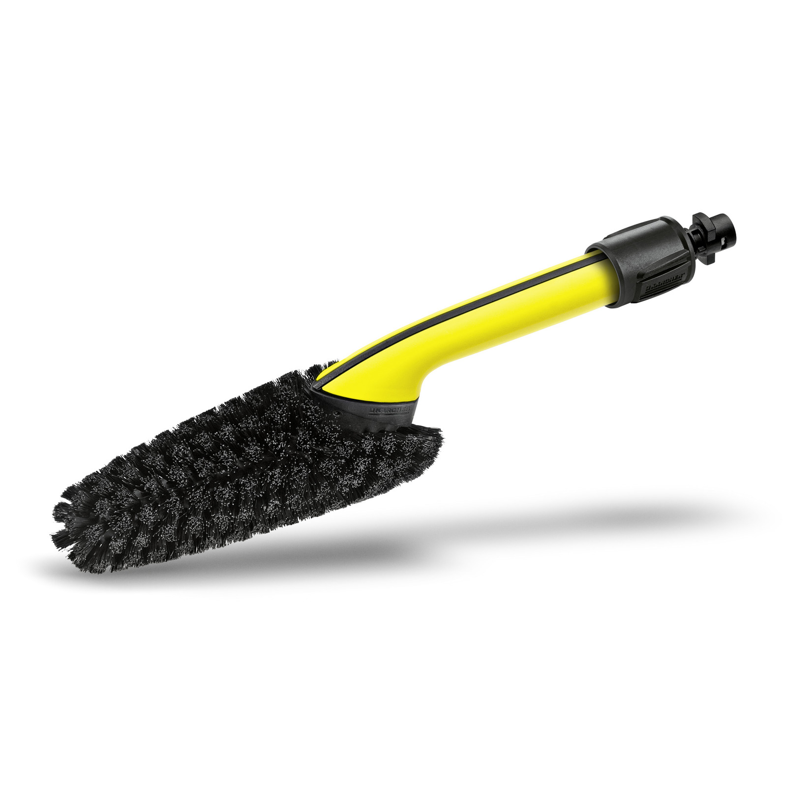 Kärcher wheel washing brush with yellow handle and black bristles, isolated on a white background. Kärcher wheel washing brush with yellow handle and black bristles, isolated on a white background.