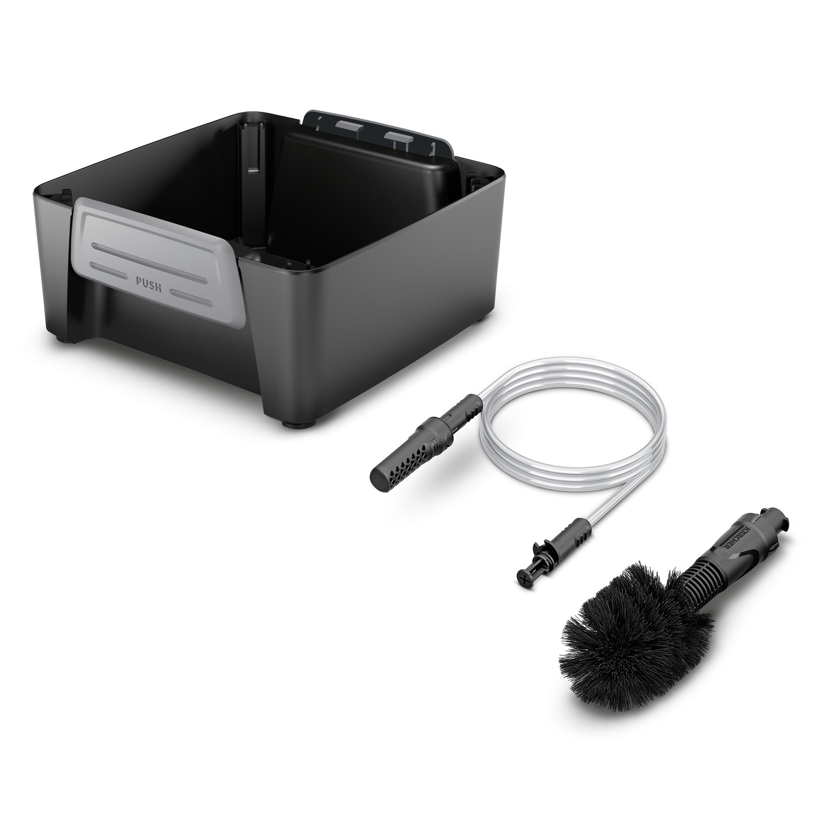 Schwarze Kärcher Zubehörteile: eine quadratische Box, ein transparenter Schlauch und eine schwarze Bürste mit Griff. Schwarze Kärcher Zubehörteile: eine quadratische Box, ein transparenter Schlauch und eine schwarze Bürste mit Griff.