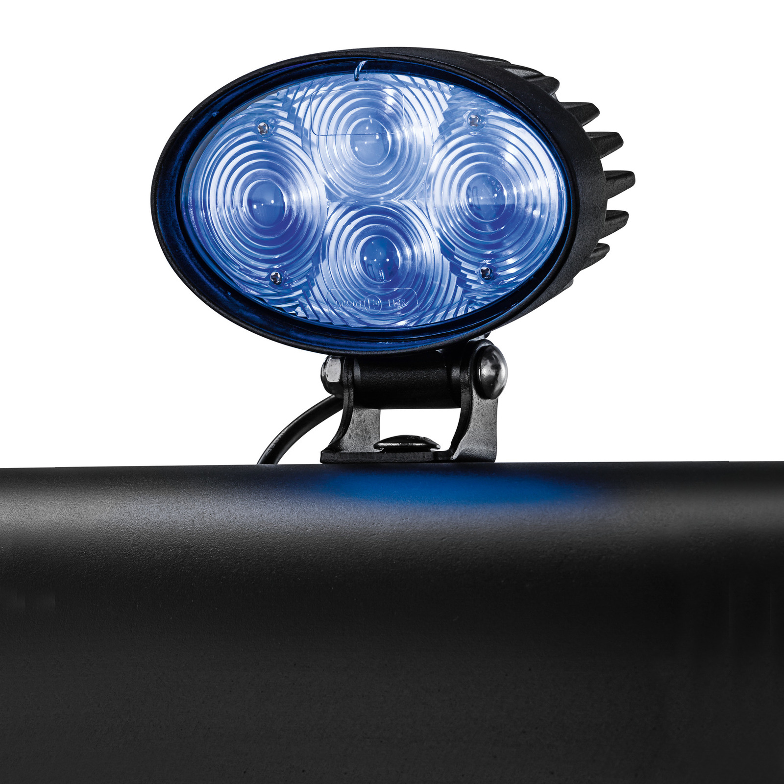 Oval-shaped blue LED light mounted on a black surface, featuring four circular lenses. Oval-shaped blue LED light mounted on a black surface, featuring four circular lenses.